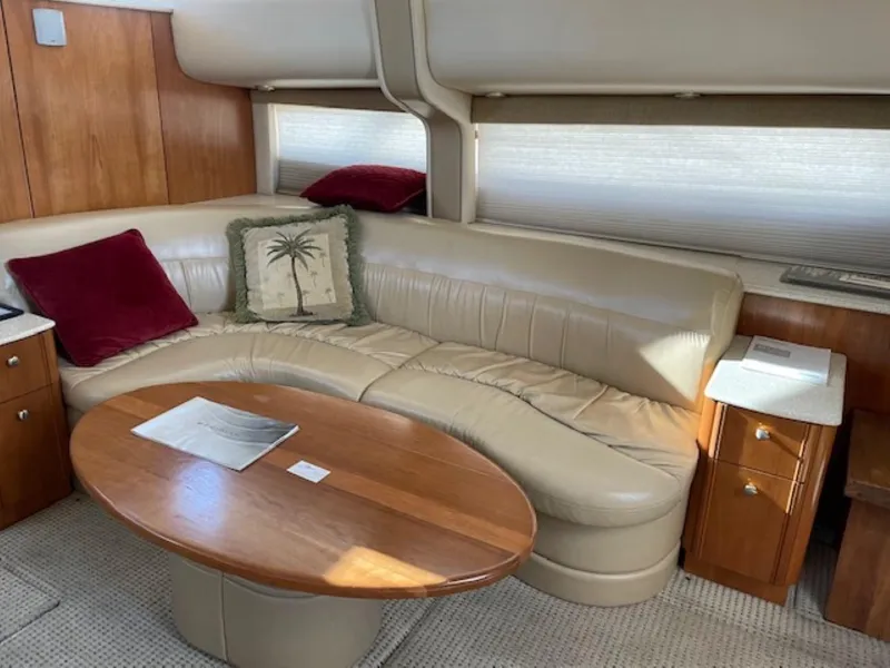 Slide: The Image of Luxurious 2004 Meridian 459 Motoryacht interior with leather seating and wooden table. - 24