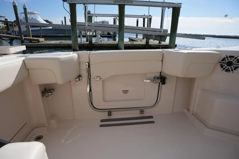 Slide: The Image of 2024 Grady-White Express 330 boat interior, featuring a sleek, modern design with comfortable seating. - 37