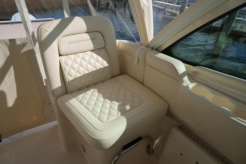 Slide: The Image of 2024 Grady-White Express 330 boat seat with quilted design and logo. - 45