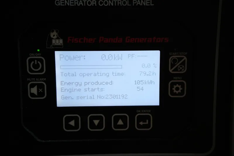 Slide: The Image of Fischer Panda generator control panel displaying power, operating time, and energy data for Grady-White Express 330. - 71