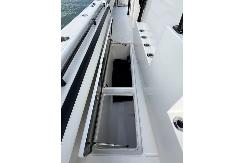 Slide: The Image of 2020 SeaHunter 41 CTS anchor compartment with chain and safety equipment. - 22