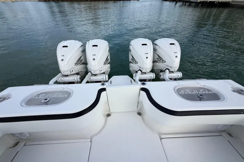 Slide: The Image of 2020 SeaHunter 41 CTS boat interior with luxurious seating and ocean view. - 34