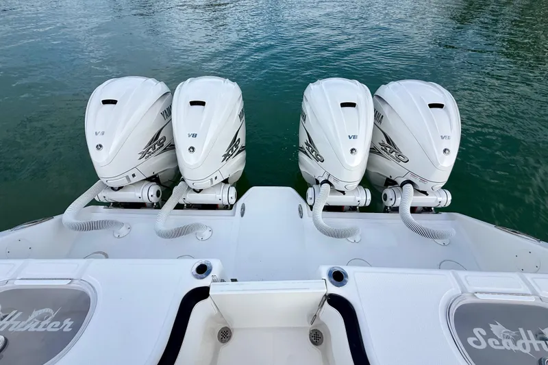 Slide: The Image of Four Yamaha V8 outboard engines on a 2020 SeaHunter 41 CTS boat. - 47