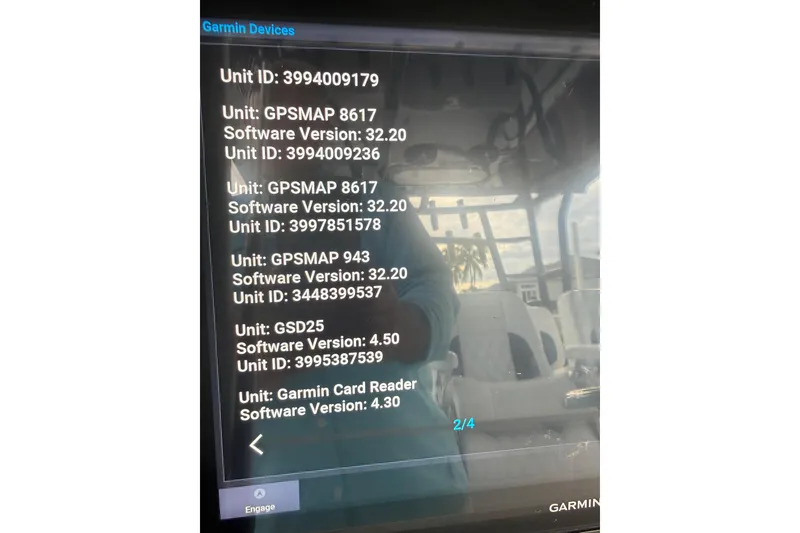 Slide: The Image of Garmin device screen displaying software versions on a 2020 SeaHunter 41 CTS boat. - 54