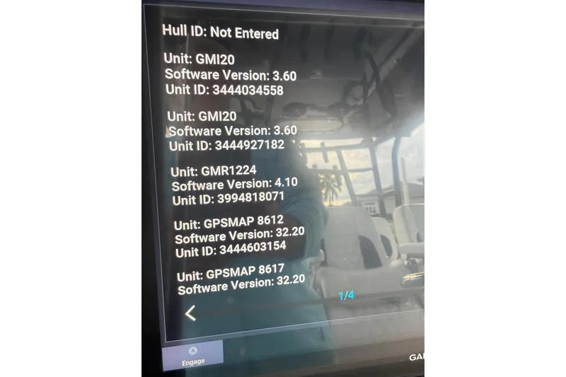 Slide: The Image of Display screen showing software versions and unit IDs on a 2020 SeaHunter 41 CTS boat. - 55