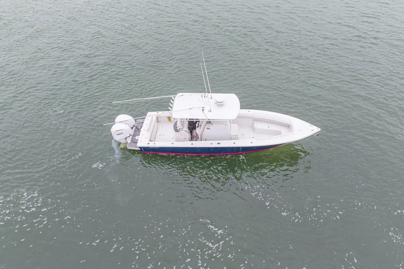 Slide: The Image of Aerial view of 2008 Jupiter 31 FS boat on calm water. - 10