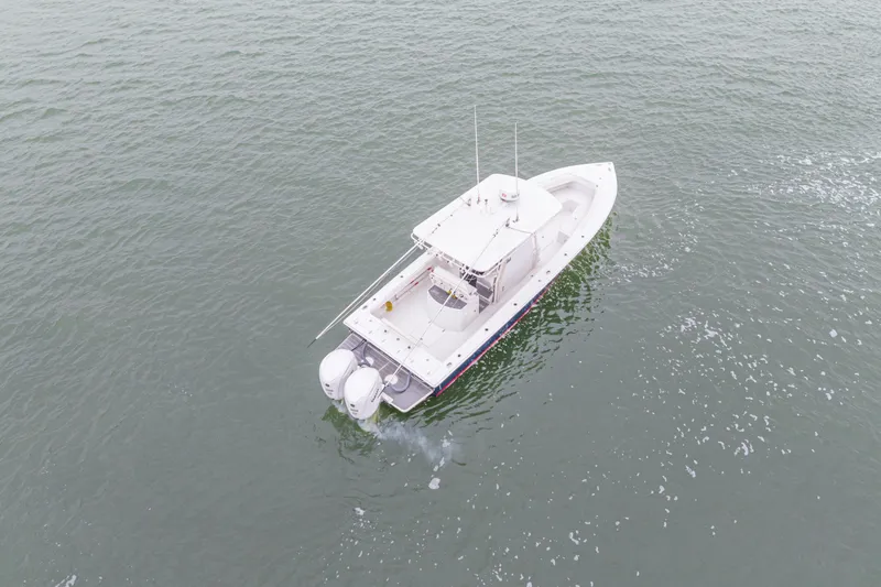 Slide: The Image of Aerial view of 2008 Jupiter 31 FS boat cruising on open water. - 11