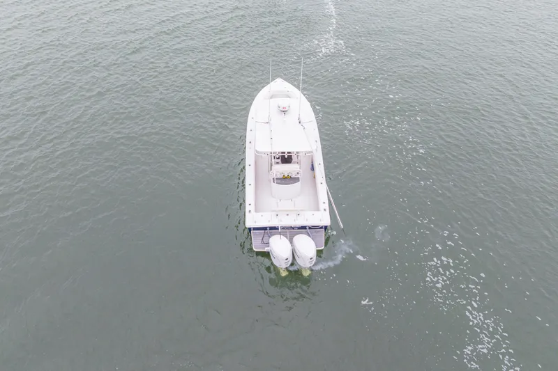 Slide: The Image of Aerial view of 2008 Jupiter 31 FS boat cruising on open water. - 12