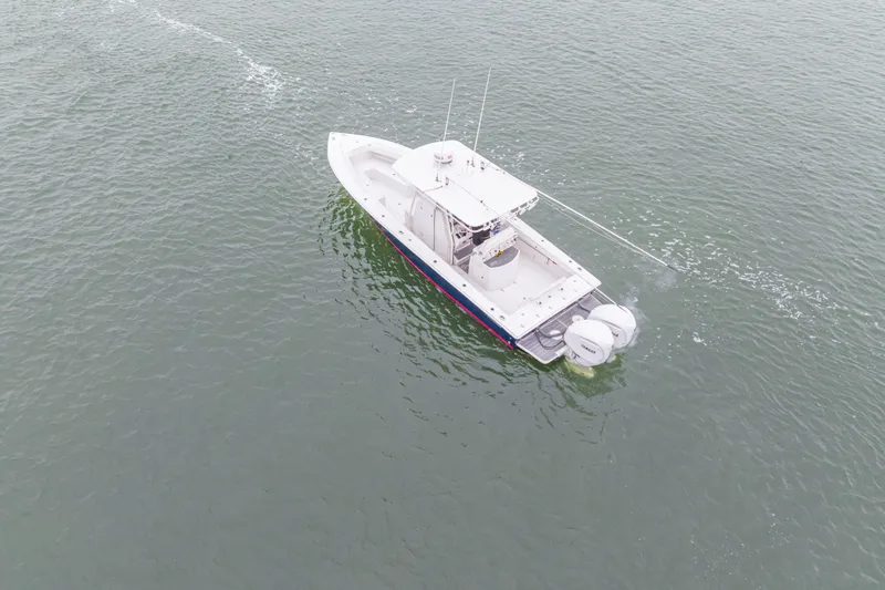 Slide: The Image of Aerial view of 2008 Jupiter 31 FS boat cruising on open water. - 13