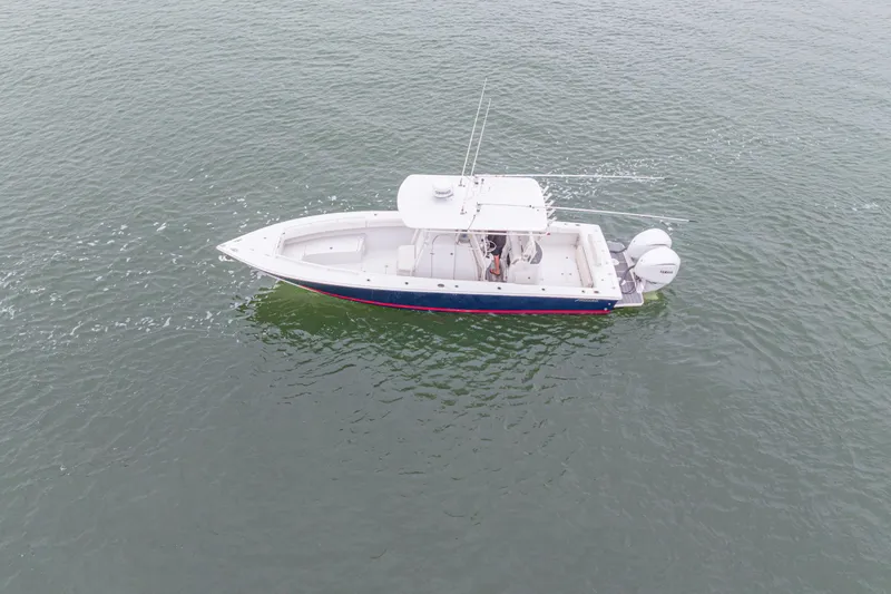 Slide: The Image of Aerial view of 2008 Jupiter 31 FS boat on calm water. - 14