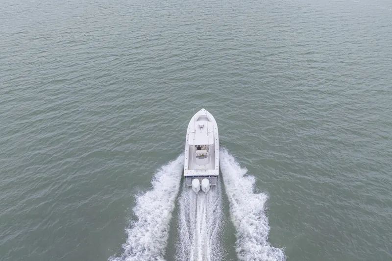 Slide: The Image of Aerial view of 2008 Jupiter 31 FS boat cruising on open water. - 16
