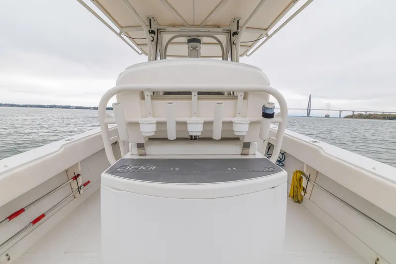 Slide: The Image of 2008 Jupiter 31 FS boat interior with rod holders and bridge view. - 37