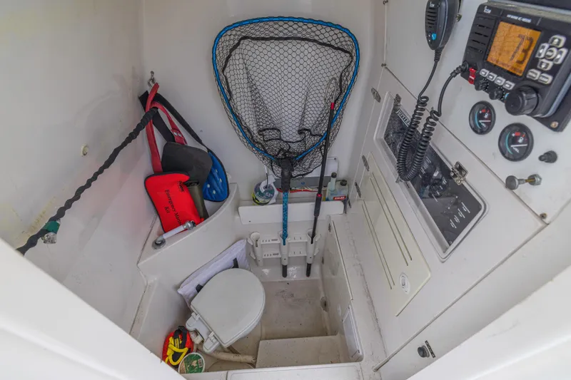 Slide: The Image of 2008 Jupiter 31 FS boat interior with fishing gear and marine equipment. - 42
