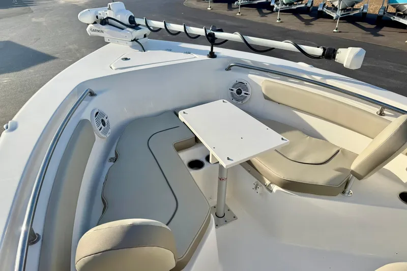 Slide: The Image of 2024 Key West 203 FS boat interior with seating and table setup. - 11