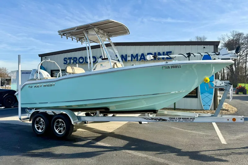 Slide: The Image of 2024 Key West 203 FS boat on trailer at Stroud Marine dealership. - 6