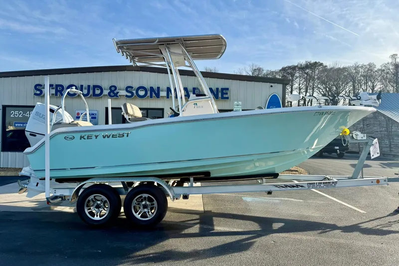 Slide: The Image of 2024 Key West 203 FS boat on trailer at Stroud & Son Marine dealership. - 7