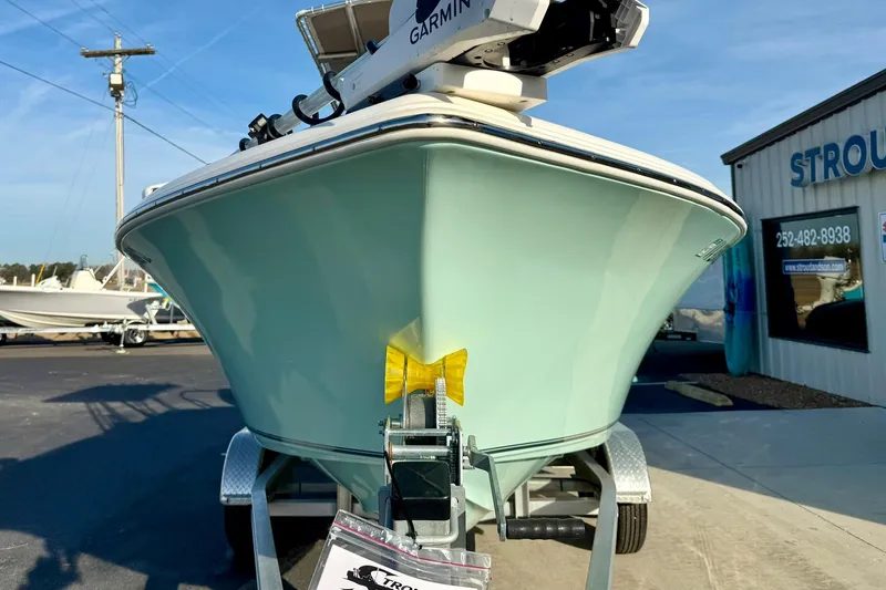 Slide: The Image of 2024 Key West 203 FS boat on trailer, front view, with Garmin equipment. - 8