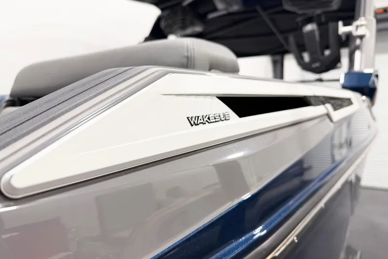 Slide: The Image of 2022 Nautique Super Air Nautique G23 Paragon boat detail with "Wakesub" logo. - 6