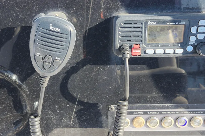 Slide: The Image of ICOM marine radio and control panel on a 2022 Tidewater 220 LXF boat. - 11