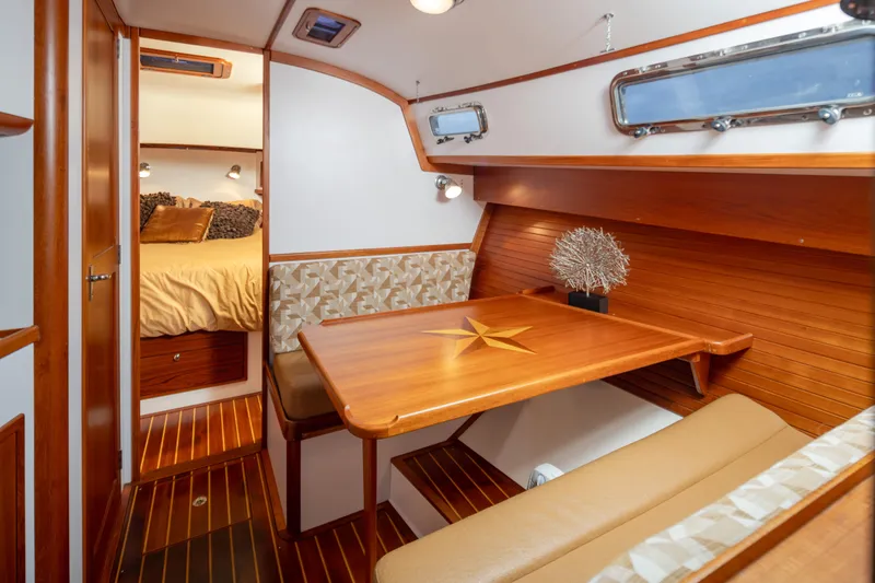 Slide: The Image of Luxurious 2007 Bruckmann BLUESTAR yacht interior with elegant wood finish and cozy seating area. - 18