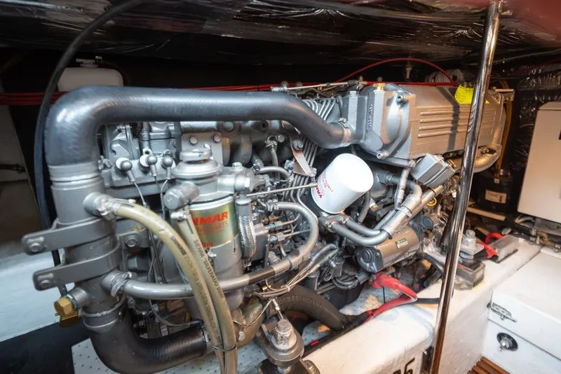 Slide: The Image of Engine room of 2007 Bruckmann BLUESTAR boat, showcasing detailed mechanical components. - 28