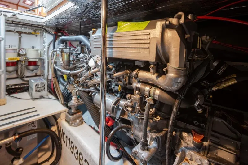 Slide: The Image of Engine room of 2007 Bruckmann BLUESTAR boat, showcasing complex machinery and components. - 30