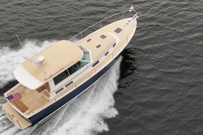 Slide: The Image of 2007 Bruckmann BLUESTAR yacht cruising on open water, aerial view. - 6