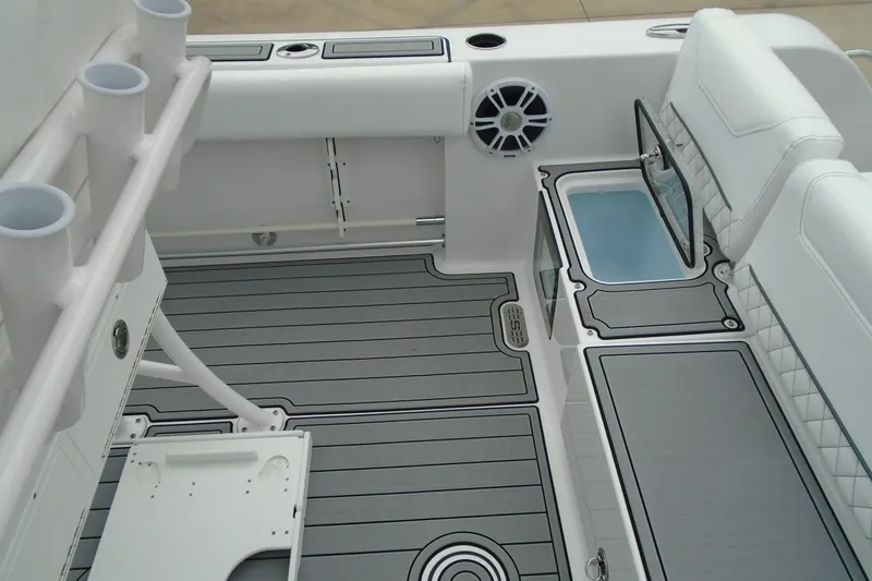 Slide: The Image of 2024 Sportsman Heritage 231 Center Console interior with seating and storage features. - 11