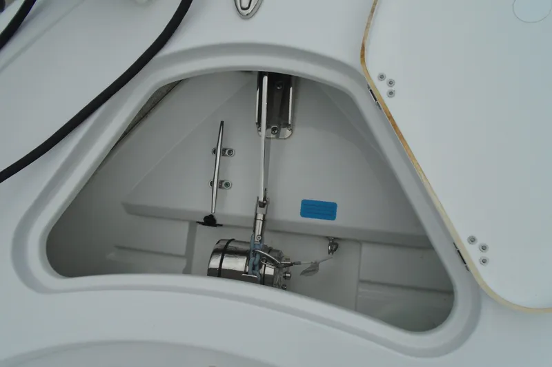 Slide: The Image of 2024 Sportsman Heritage 231 Center Console storage compartment detail. - 14