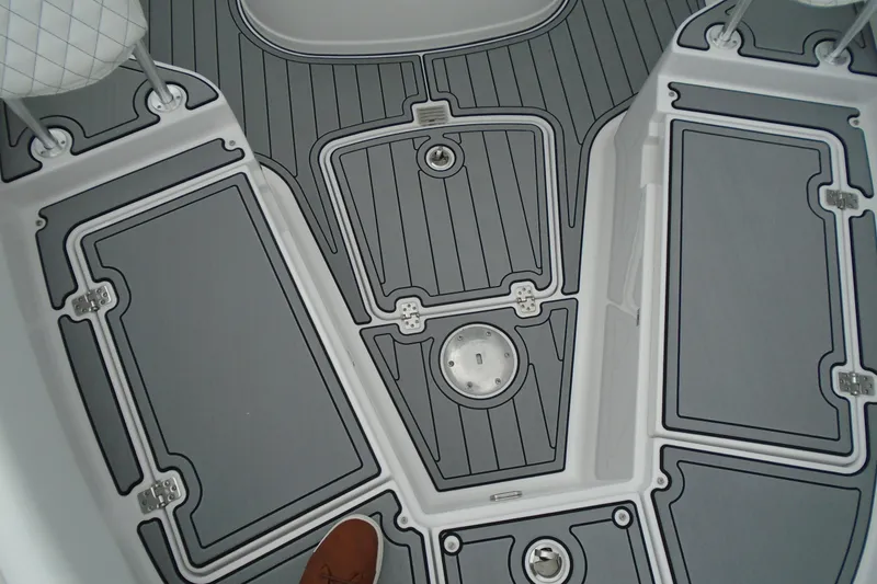 Slide: The Image of 2024 Sportsman Heritage 231 Center Console boat deck with gray non-slip surface. - 15