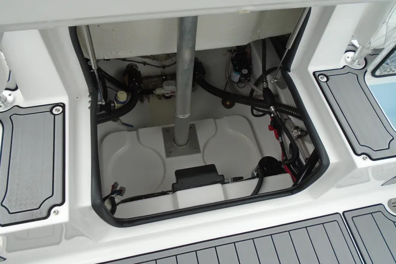 Slide: The Image of 2024 Sportsman Heritage 231 Center Console boat interior compartment view. - 6