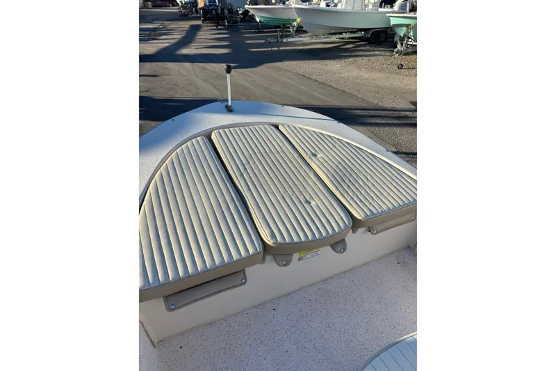 Slide: The Image of 2018 Carolina Skiff 18 JVX CC boat deck with storage compartments. - 7