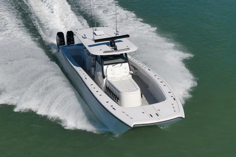 Slide: The Image of Freeman 43 boat cruising on water, 2023 model, aerial view. - 16