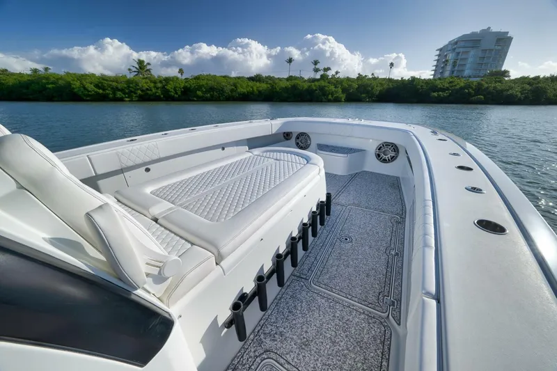 Slide: The Image of Luxurious 2023 Freeman 43 boat interior with plush seating, scenic waterfront view. - 21