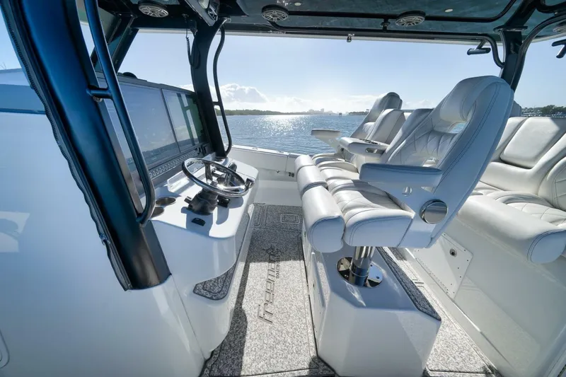 Slide: The Image of Luxurious interior of 2023 Freeman 43 boat with plush seating and modern helm. - 29