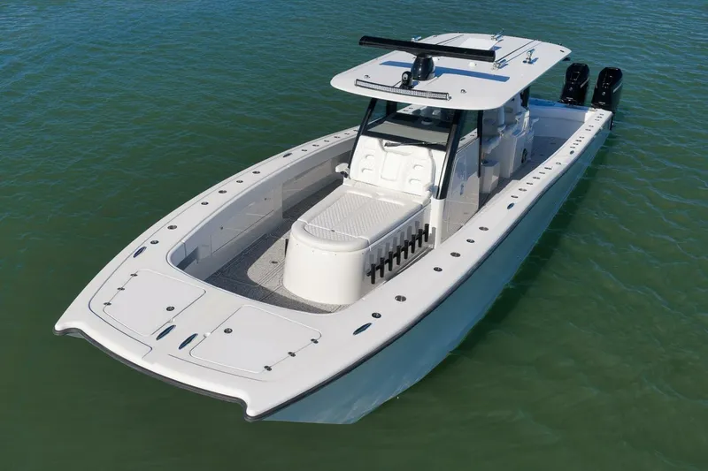 Slide: The Image of 2023 Freeman 43 boat on water, featuring sleek design and spacious deck. - 6