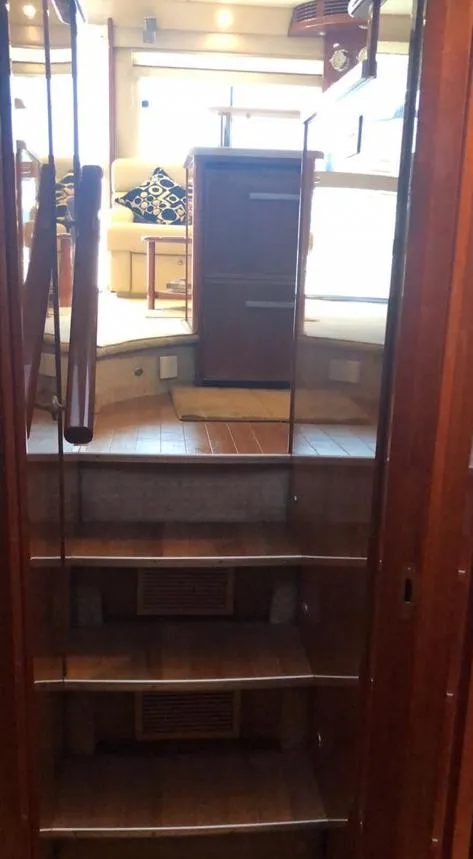 Slide: The Image of Interior stairs of 2009 Riviera 47 Enclosed Flybridge Series II yacht. - 35