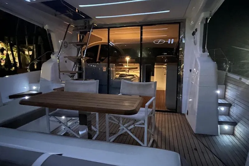 Slide: The Image of Luxury 2019 Schaefer 510 GT Pininfarina yacht cockpit at night. - 11