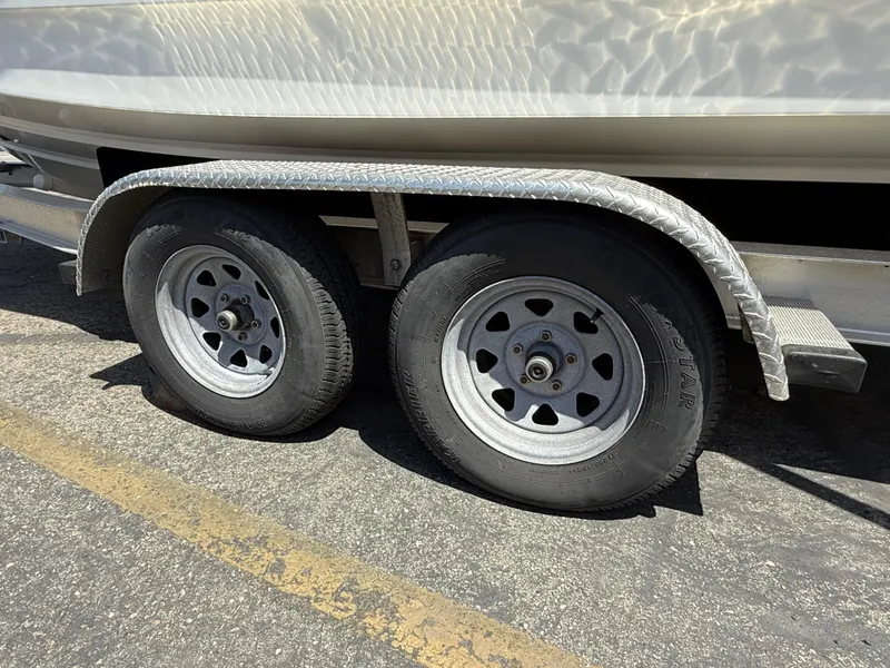 Slide: The Image of Trailer wheels of a 2019 Boston Whaler 230 Outrage boat. - 36