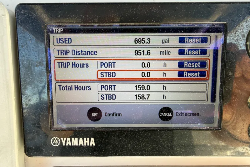 Slide: The Image of Yamaha display showing trip data for 2014 Everglades 295 Center Console boat. - 7