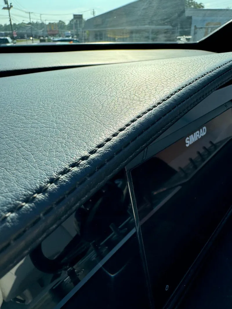 Slide: The Image of Dashboard of 2025 Four Winns H6 OB boat with Simrad display. - 19