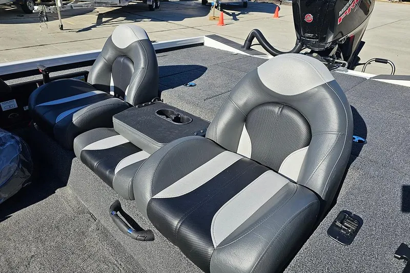 Slide: The Image of 2026 Vexus Defender 189 boat seats with sleek black and gray design. - 15