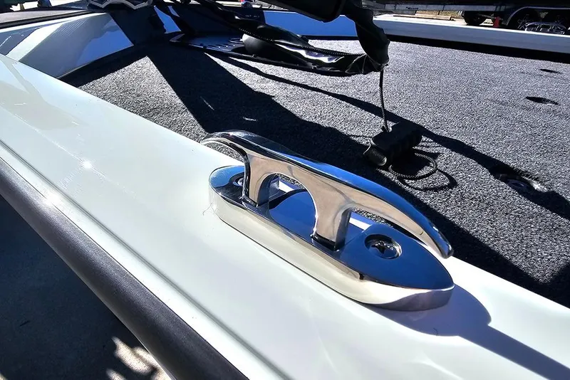 Slide: The Image of Close-up of a 2026 Vexus Defender 189 boat cleat on deck. - 24