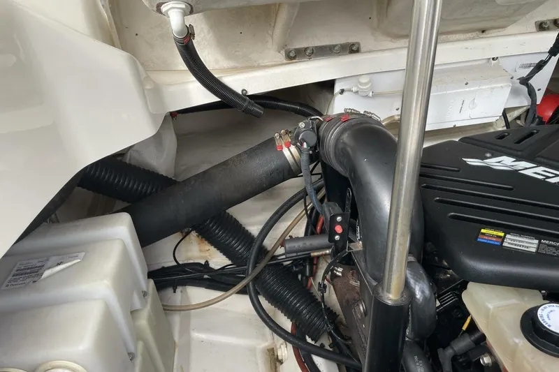 Slide: The Image of Engine compartment of a 2008 Sea Ray 270 SLX boat, featuring a MerCruiser engine. - 29
