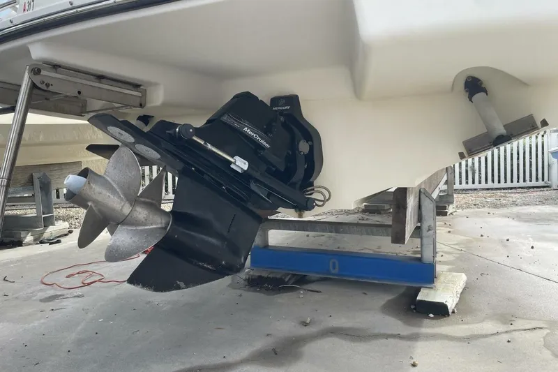 Slide: The Image of 2008 Sea Ray 270 SLX boat with MerCruiser outdrive on a stand. - 32