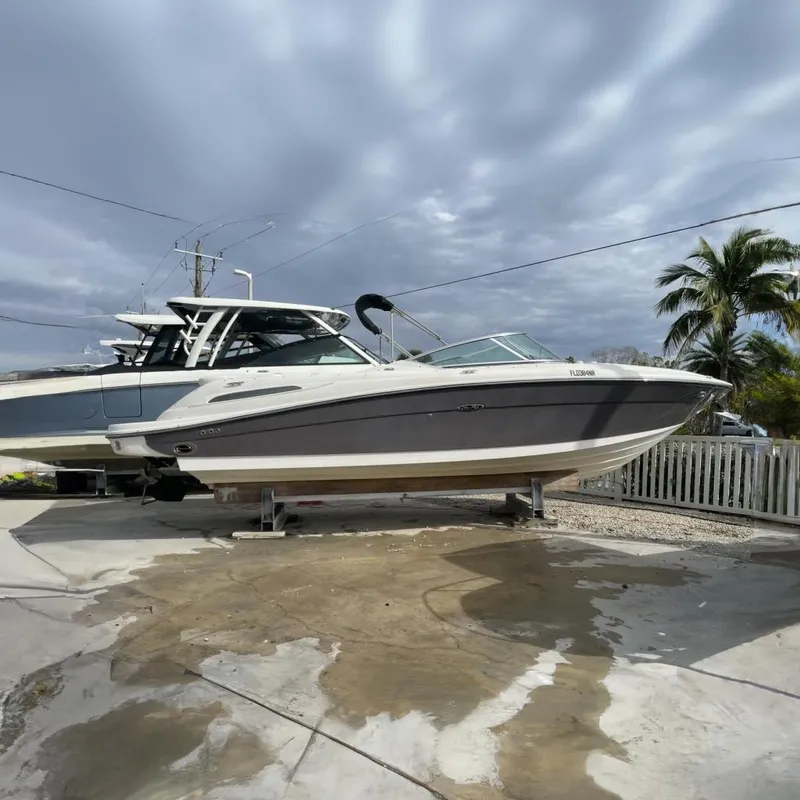 Slide: The Image of 2008 Sea Ray 270 SLX boat on a dry dock. - 35