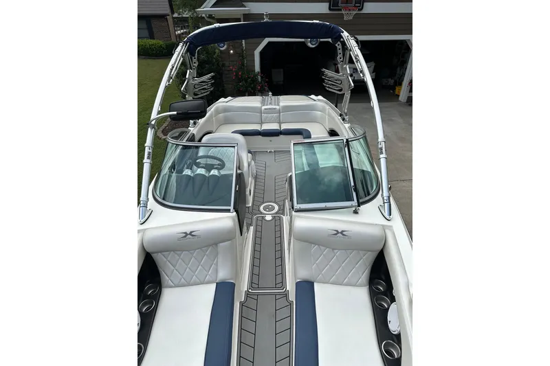 Slide: The Image of 2007 MasterCraft X-45 boat interior with sleek seating and modern design. - 7