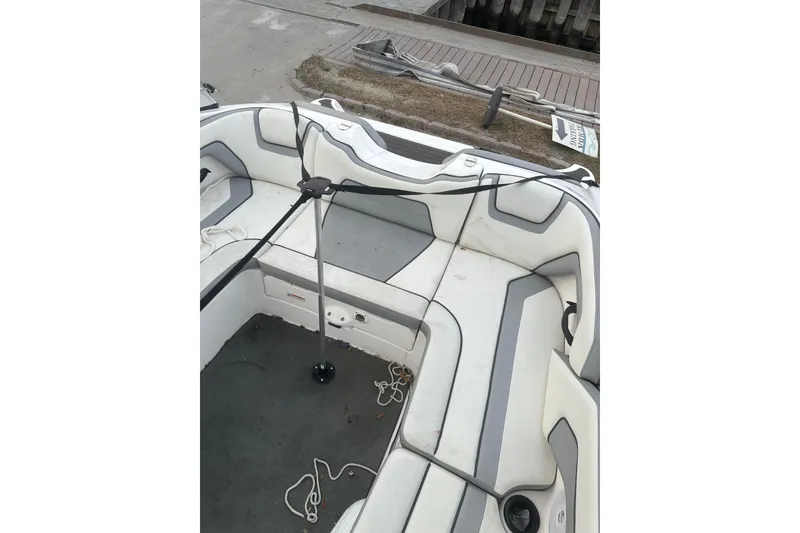 Slide: The Image of 2017 Yamaha Boats AR190 interior with seating and storage compartments. - 5