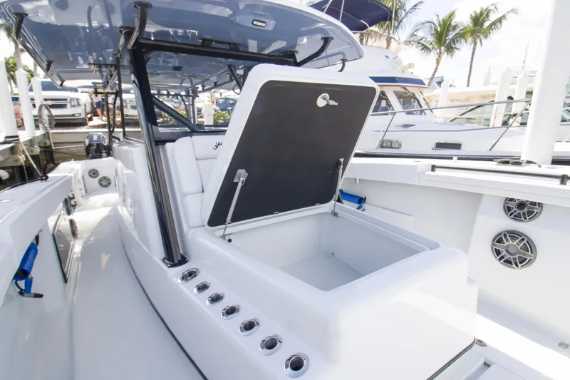 Slide: The Image of 2026 Yellowfin 42 Offshore boat interior with modern helm and seating. - 11