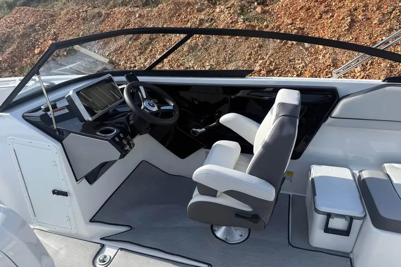 Slide: The Image of 2026 Yamaha Boats SX250 cockpit with modern steering and seating. - 8